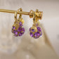 Boucles d'oreilles créoles vintage plaquées or avec sphère en cristal violet