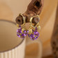 Boucles d'oreilles créoles vintage plaquées or avec sphère en cristal violet