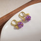Boucles d'oreilles créoles vintage plaquées or avec sphère en cristal violet
